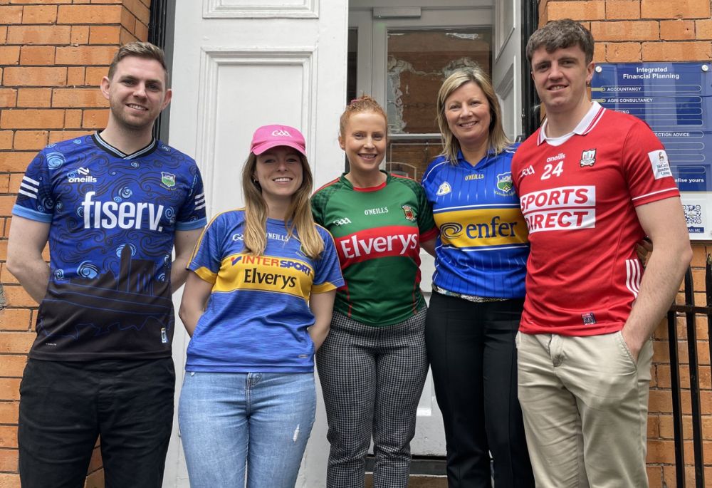 FDC Cork team wearing GAA jerseys.